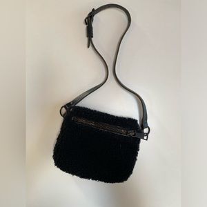 Your Bag of Holding authentic shearling cross body bag.